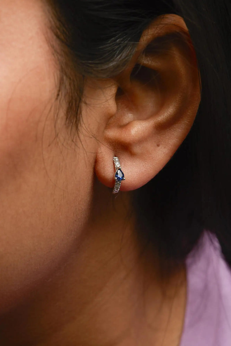 10K White Gold Pear Shaped Blue Sapphire and 1/10 Cttw Diamond Huggy Hoop Earrings (H-I Color, I1-I2 Clarity) - The Snow Owls